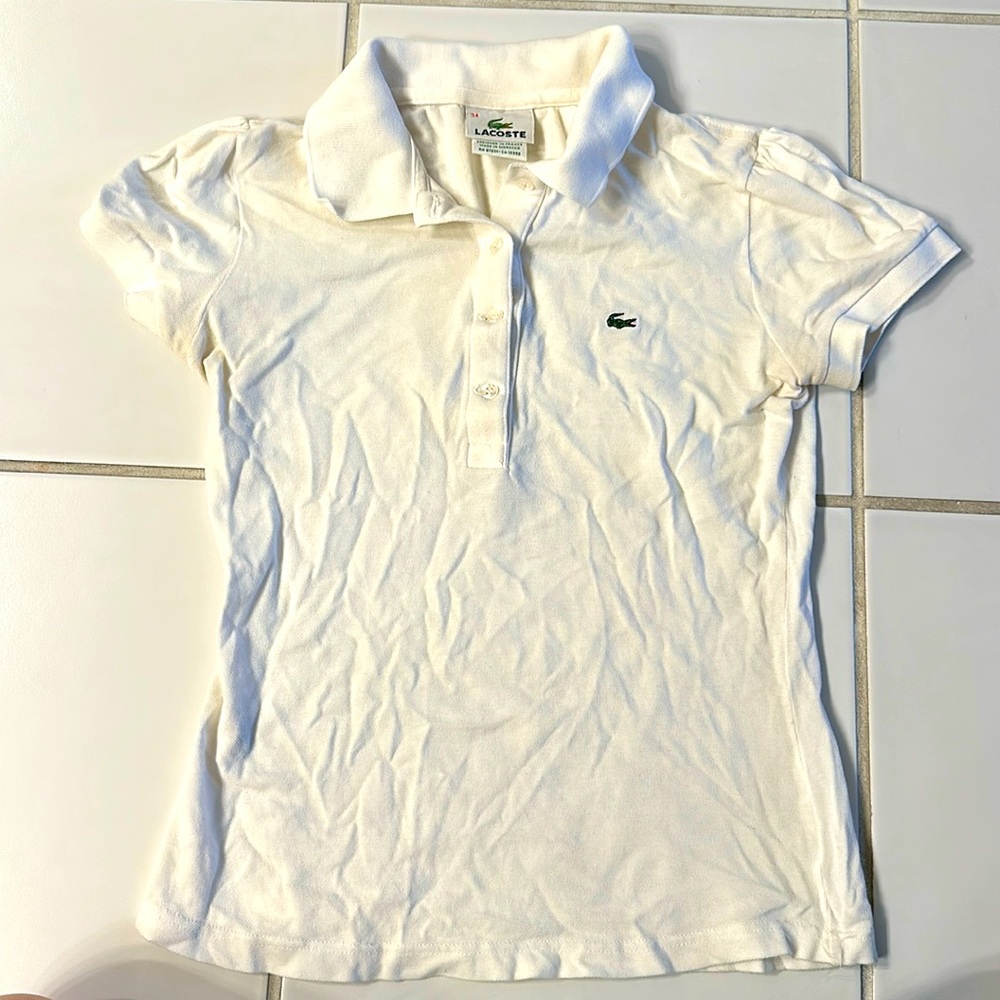 Lacoste White polo with ruffled shoulders